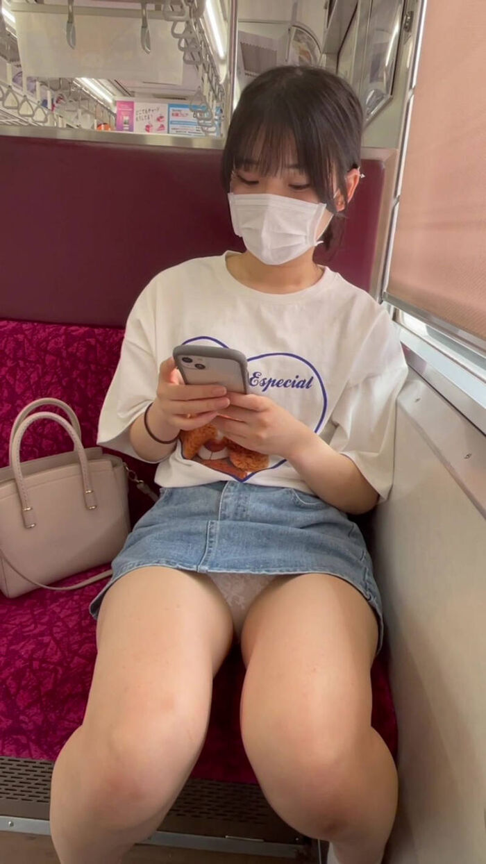 Panty shot erotic image of a female college student on the train 15th image