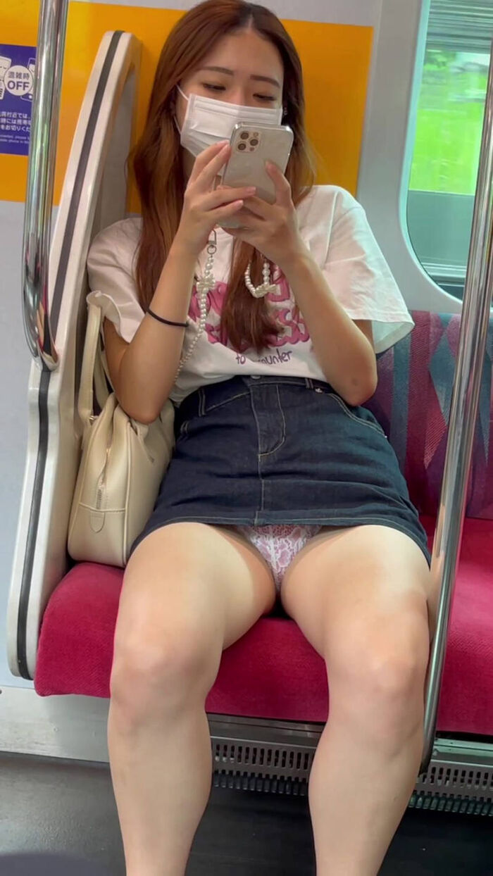 Panty shot erotic image of a female college student on the train 6th image